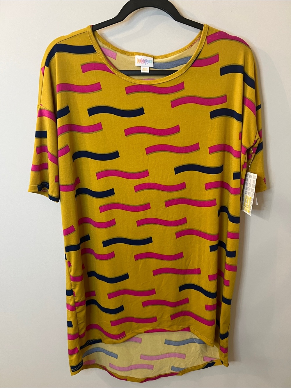 LuLaRoe Mustard Yellow Top with Pink and Navy Wave Print